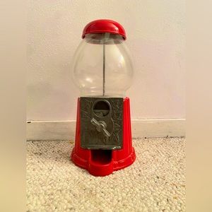 Red gum ball machine. Good condition.